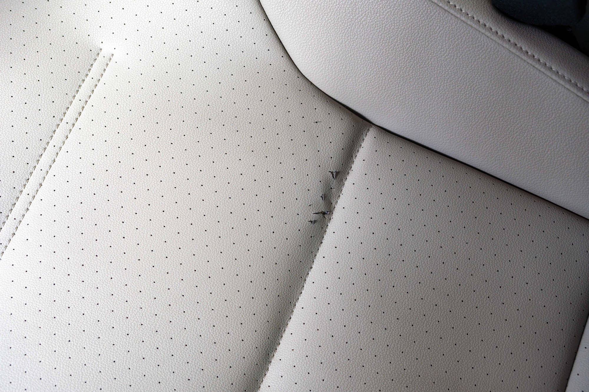 Driver Seat Upholstery Damage