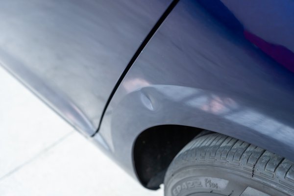 Driver Side Rear Quarter Panel Ding
