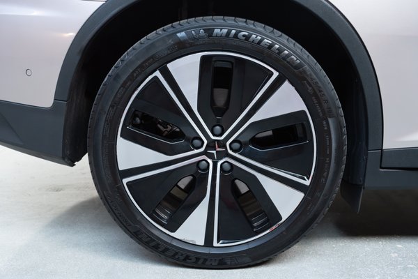 Curb rash on passenger side rear wheel