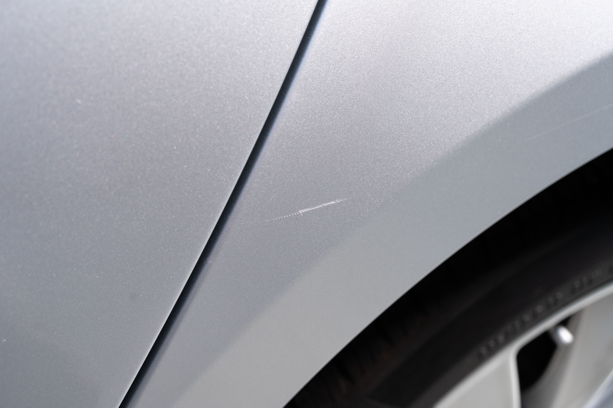 Light scratch driver side rear quarter panel