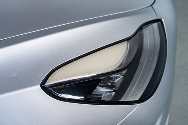 Superficial yellowing around daylight running light lens