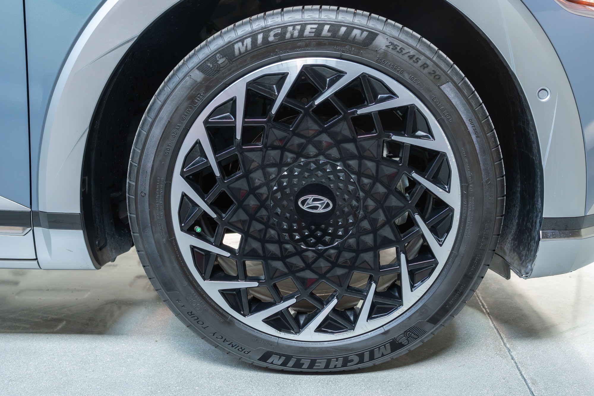 Mild curb rash on passenger side front wheel