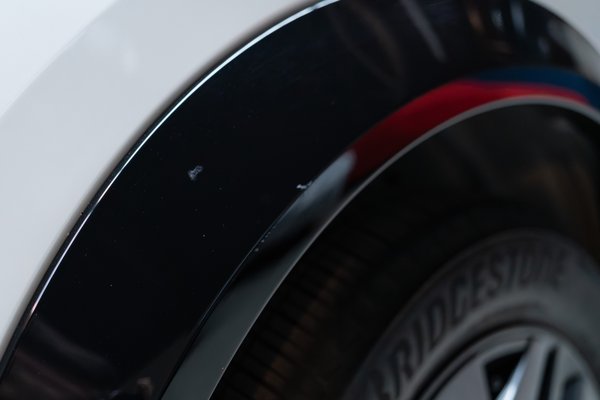 Scratch on passenger side wheel arch trim