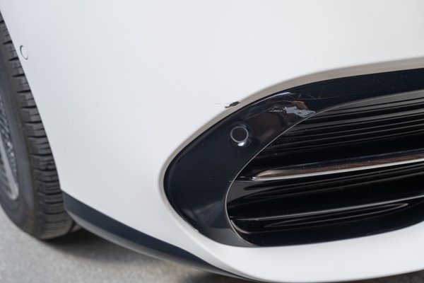 Driver Side Front Bumper Scrape